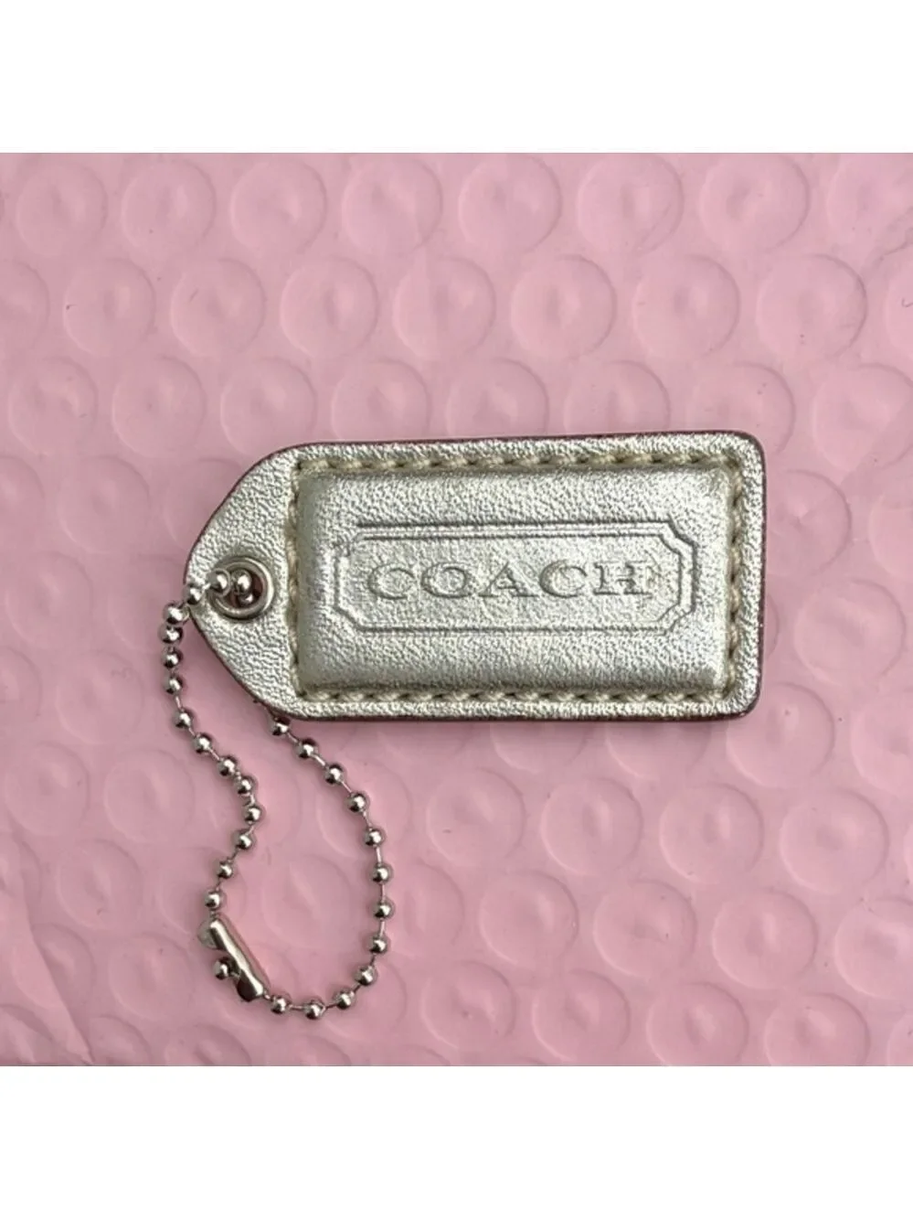 Coach Shimmering Silver Tag Keychain Coach Hangtag Coach bag accessories